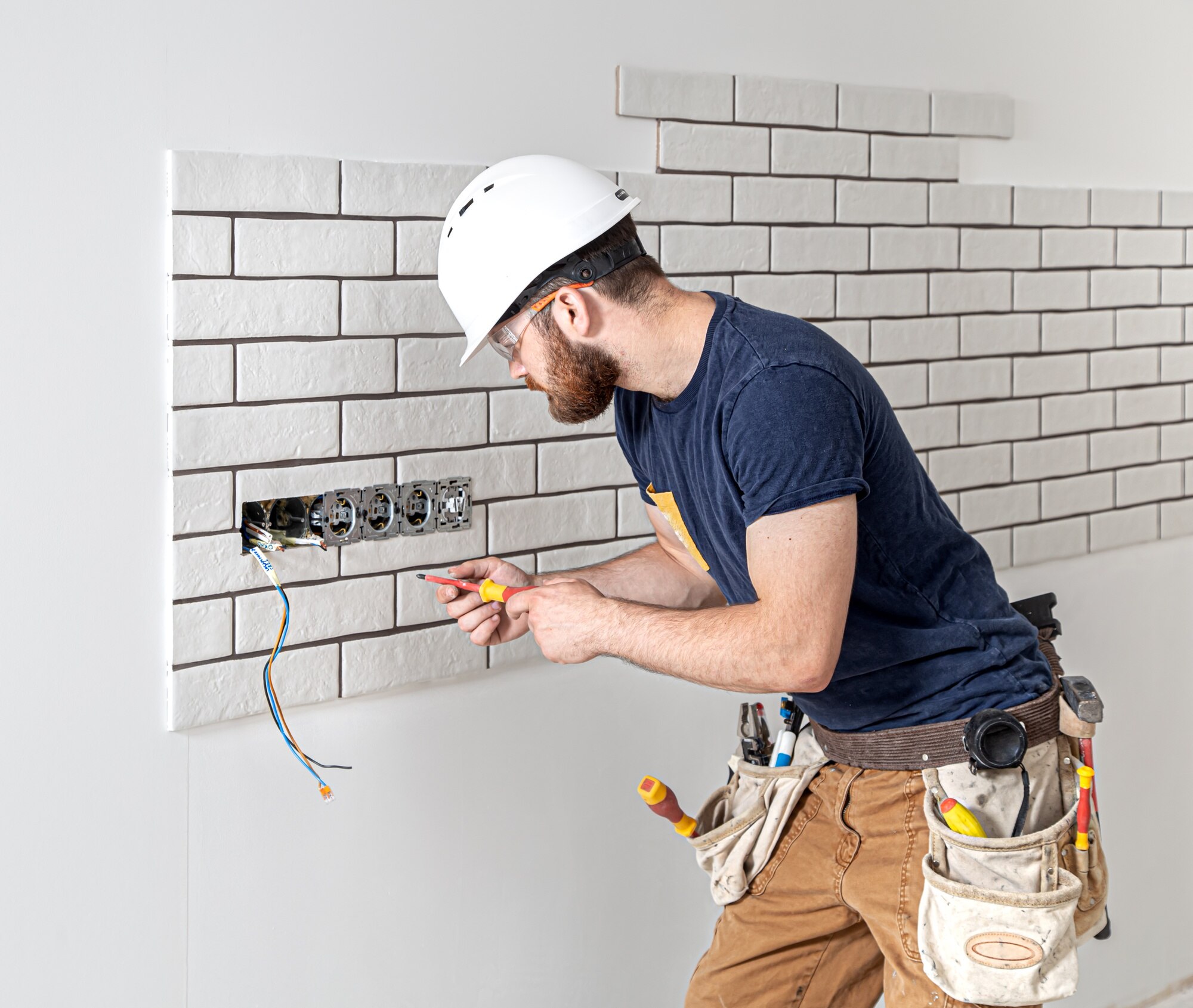 electrician construction worker with beard overalls installation sockets home renovation concept 169016 7329